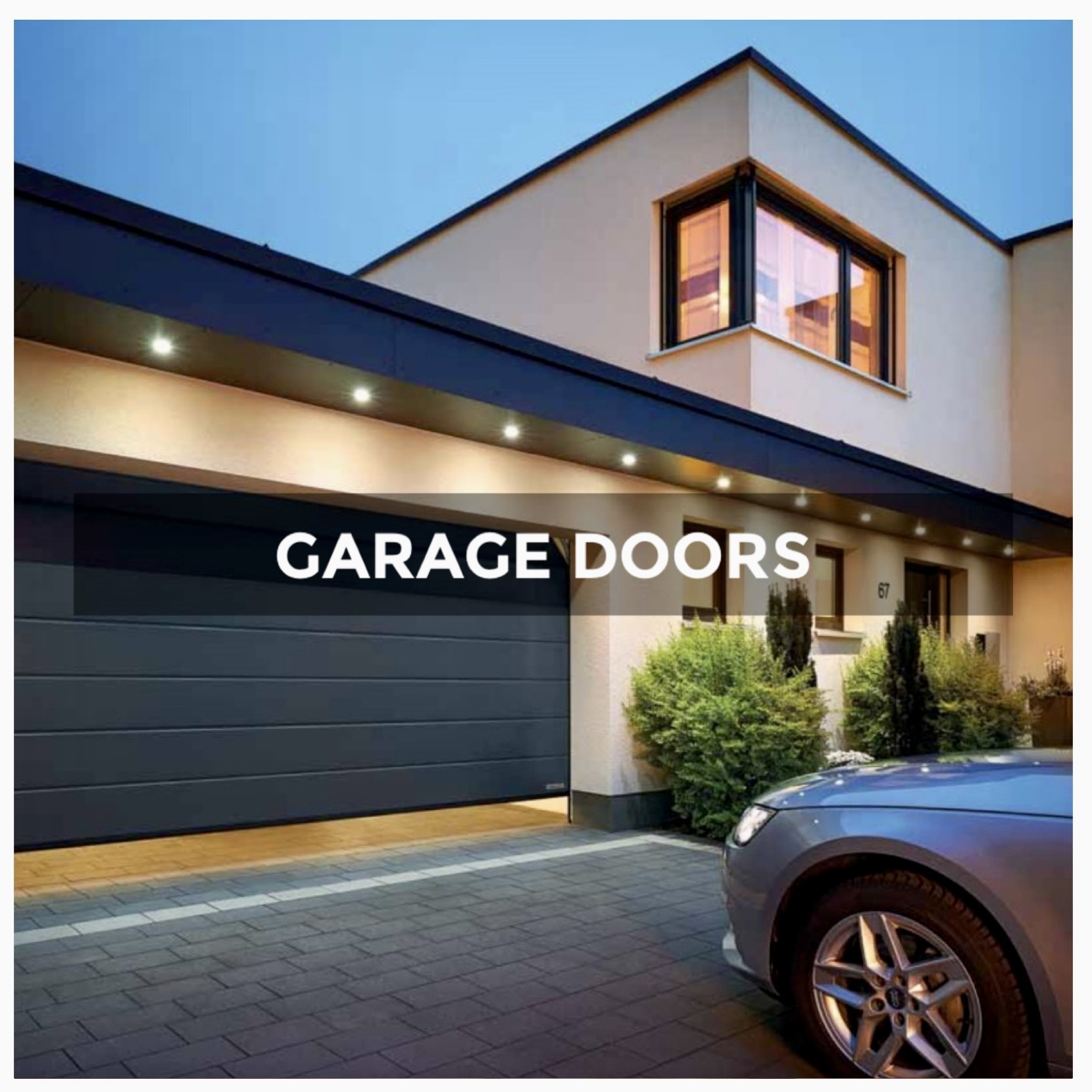 Black garage door at the front of a house